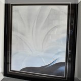 A14. Large format Georgia O'Keeffe style print with black lacquer frame. Frame: 46”h x 40”w 